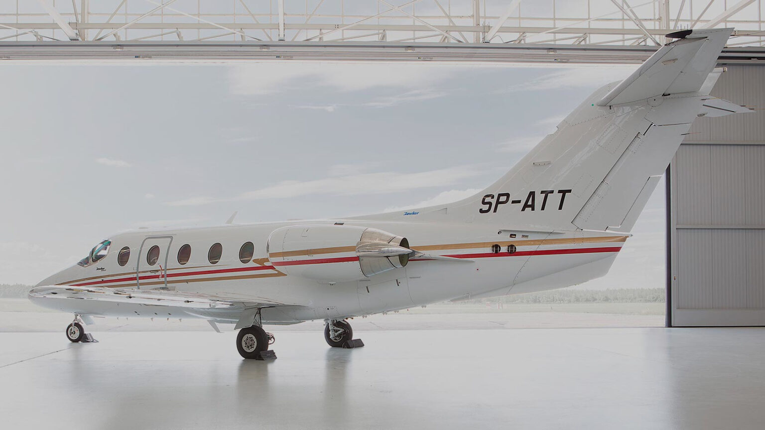 Smart Jet Hawker 400XP aircraft in a hangar