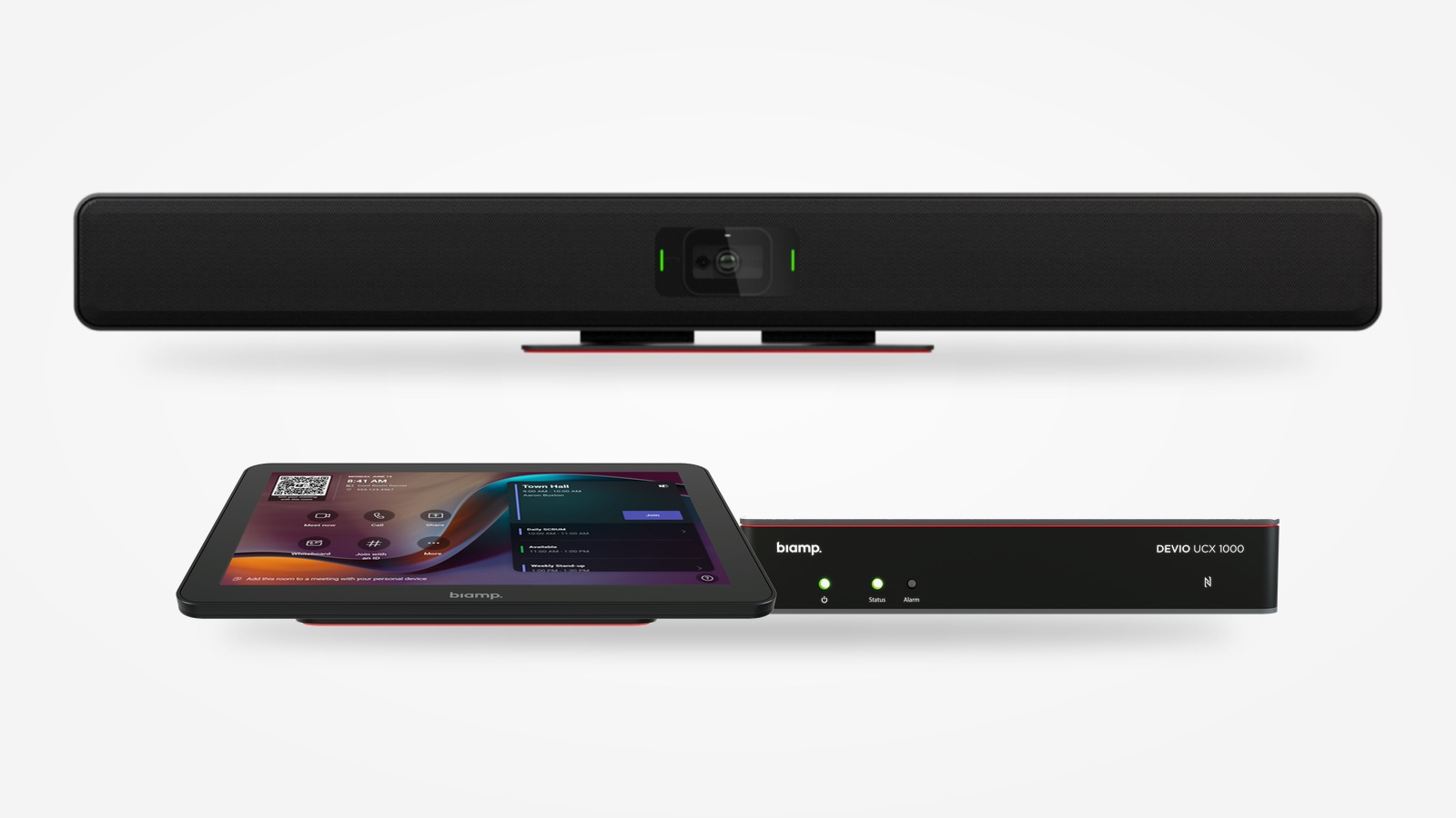Wideobar Biamp VBC 2800 z kamerą, a pod nim panel dotykowy Apprimo Touch 10 z interfejsem Microsoft Teams i jednostka Devio UCX 1000 na jasnoszarym tle